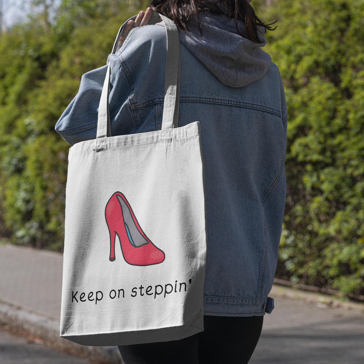 Vibrant shoe illustration on tote bag for self-belief and positive steps - Yemisi Olusanya
